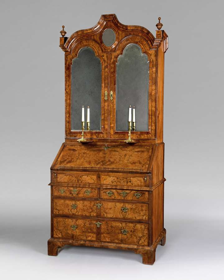 A superb Queen Anne period veneered walnut bureau bookcase